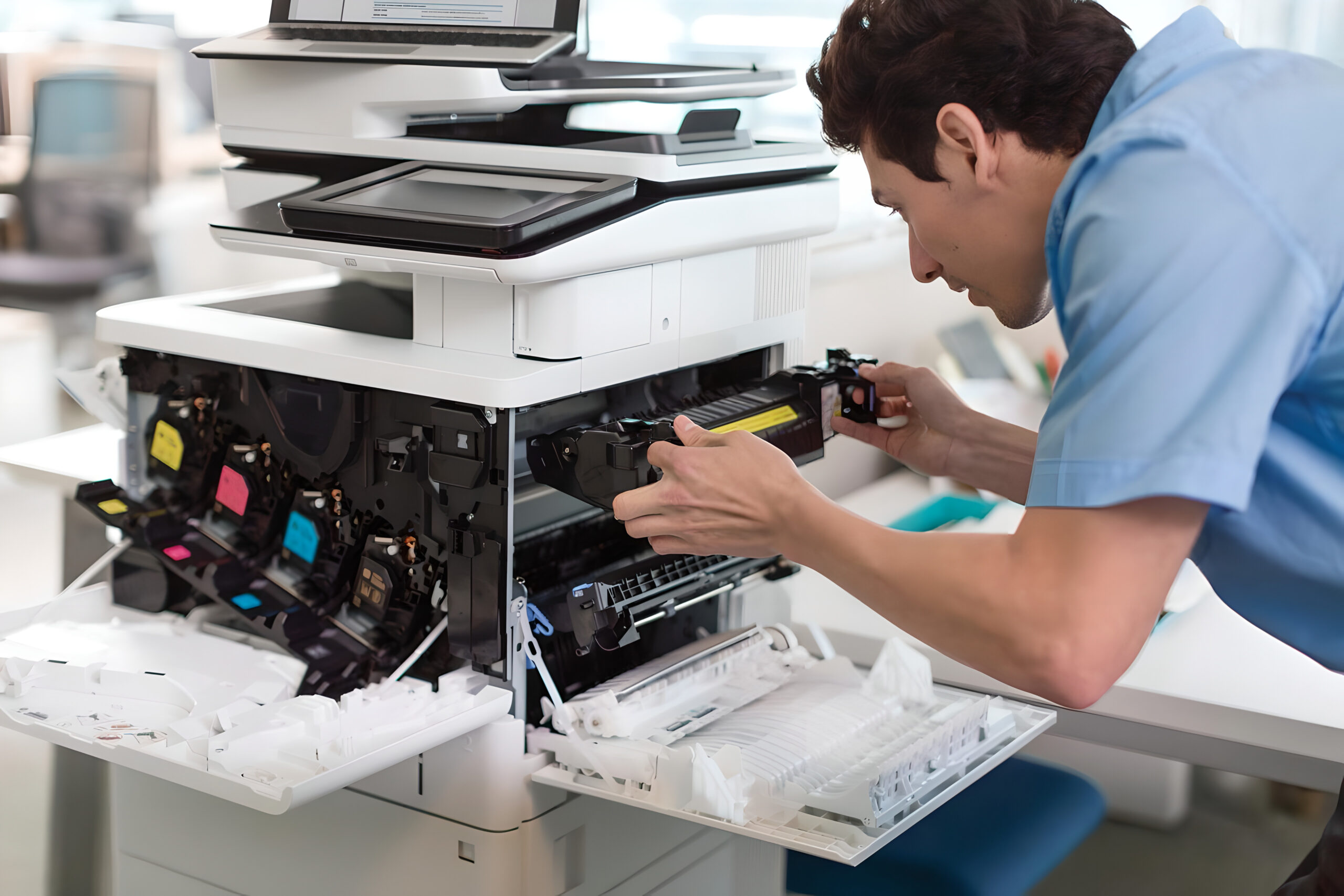 Printing services Singapore technician maintaining commercial printing equipment