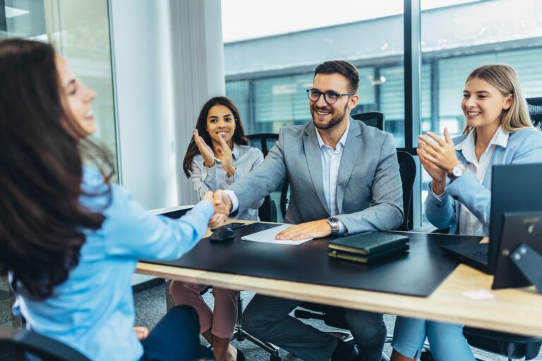 Business interview between HR manager and job candidate in modern office