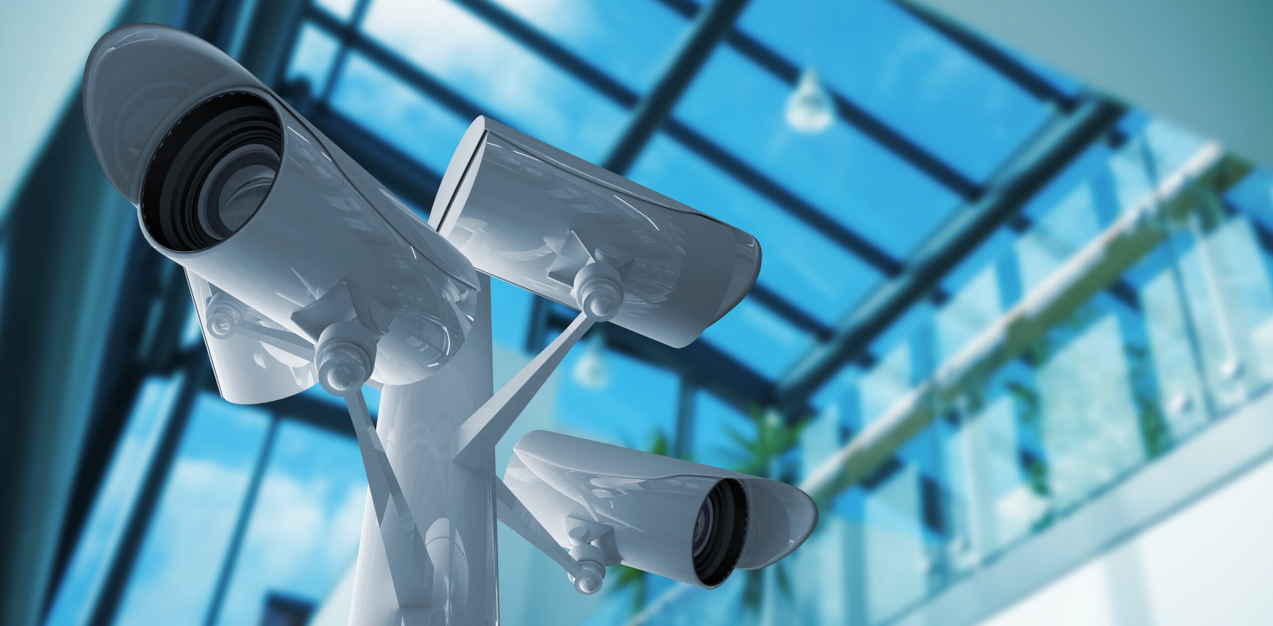 Outdoor surveillance cameras mounted on a commercial building