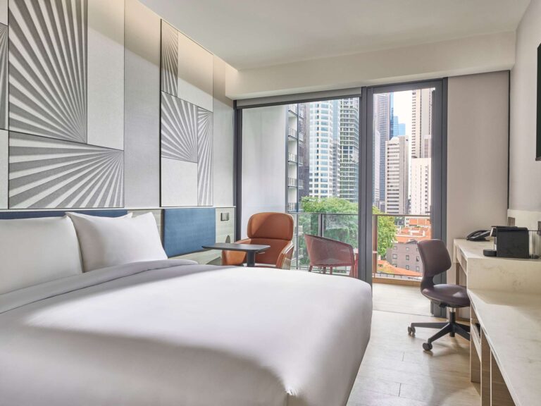 Modern staycation hotel room with city views in Singapore