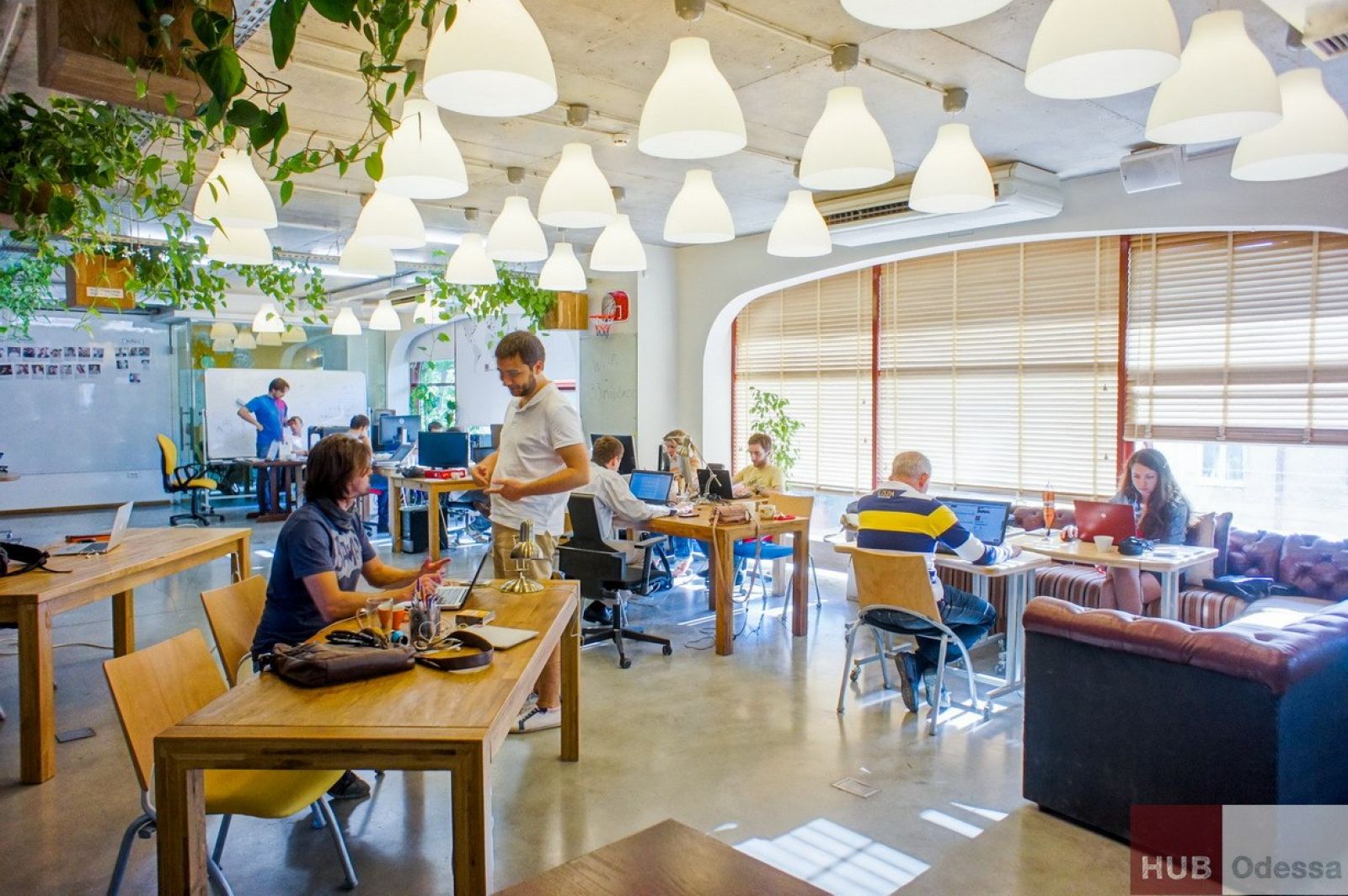 Creative coworking space with collaborative desks and lounge area