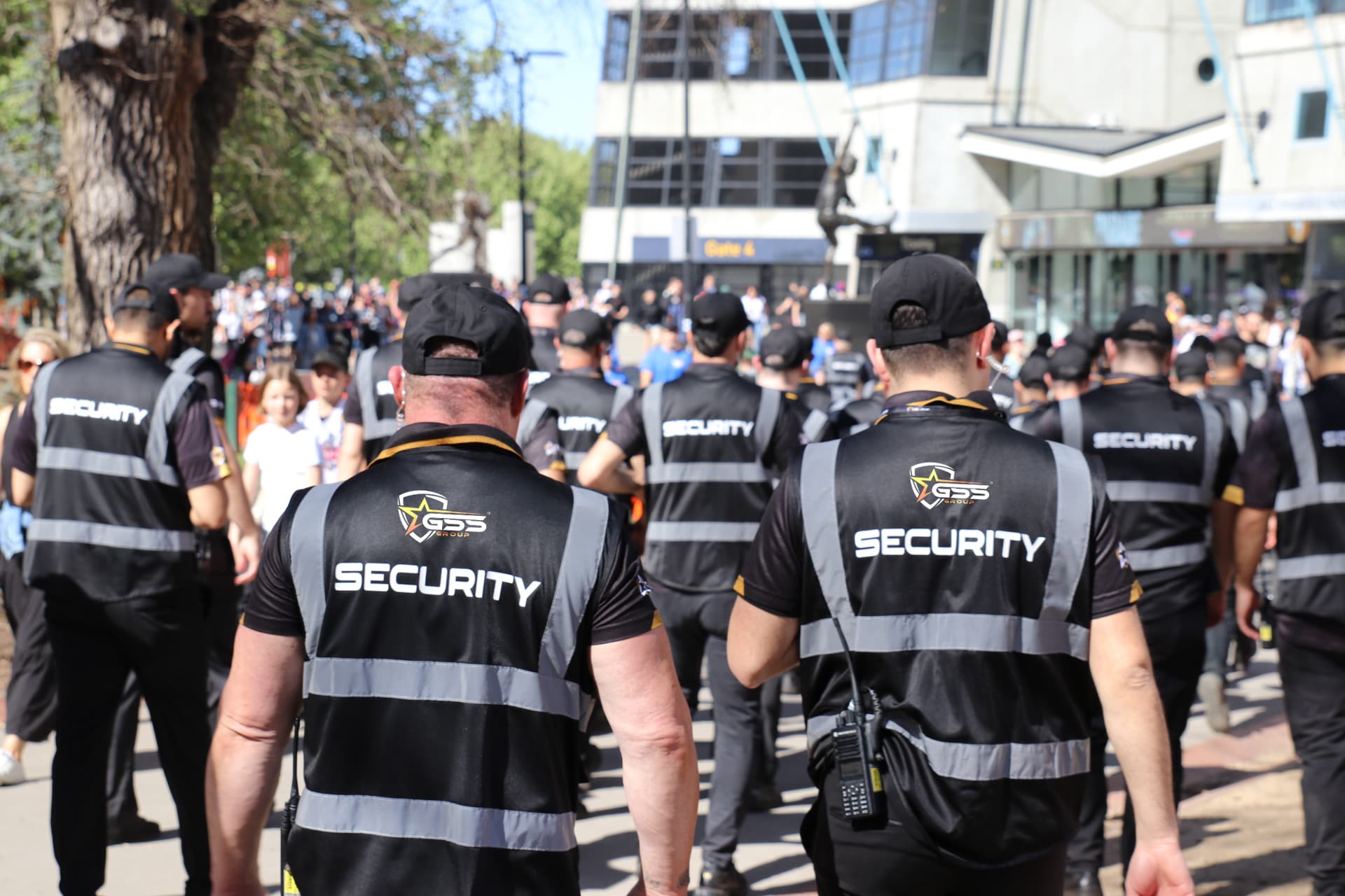 Uniformed security officers patrolling a commercial area in Singapore