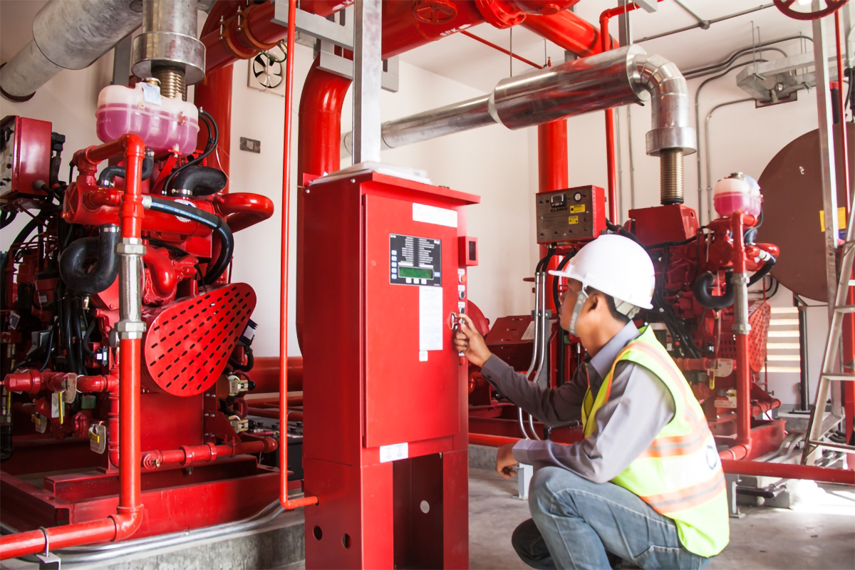 Best Fire Protection Services Singapore Technician servicing commercial fire pump and suppression equipment