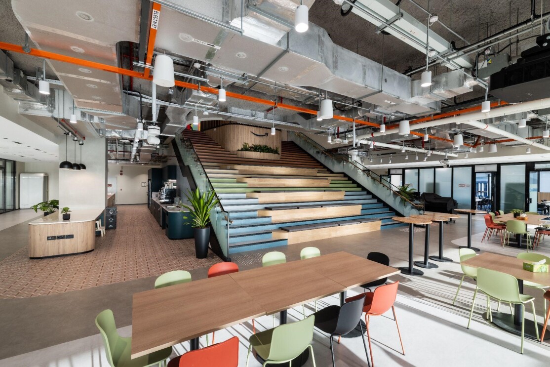 Spacious virtual office workspace with shared desks and modern interior in Singapore