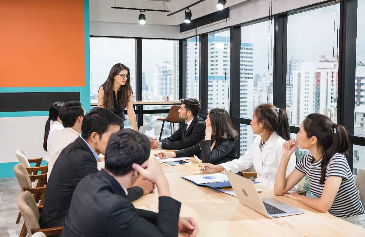 Business consultants leading corporate strategy meeting in Singapore