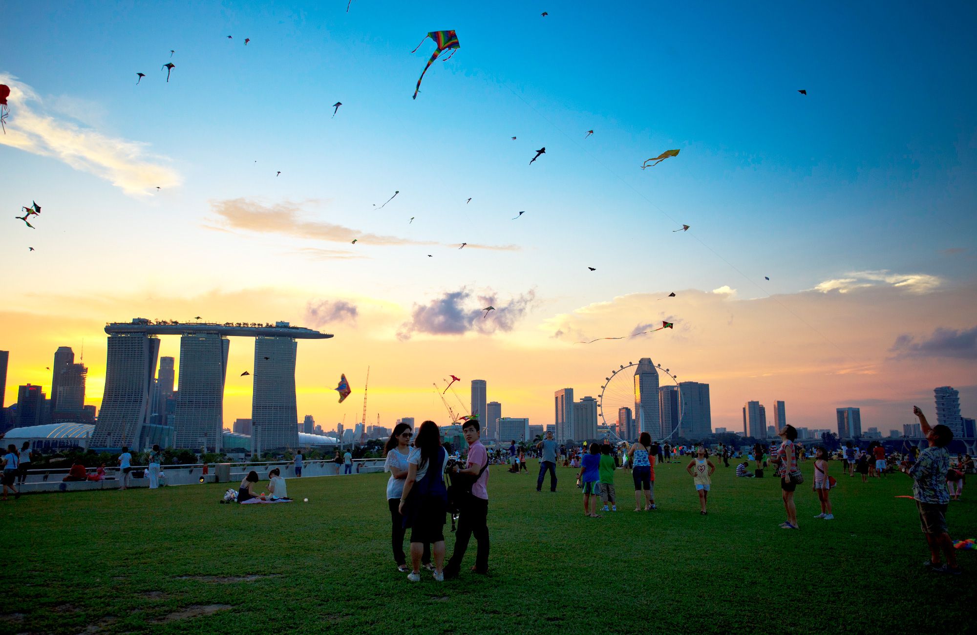 Best Weekend Activities Singapore People relaxing at Marina Barrage during sunset in Singapore
