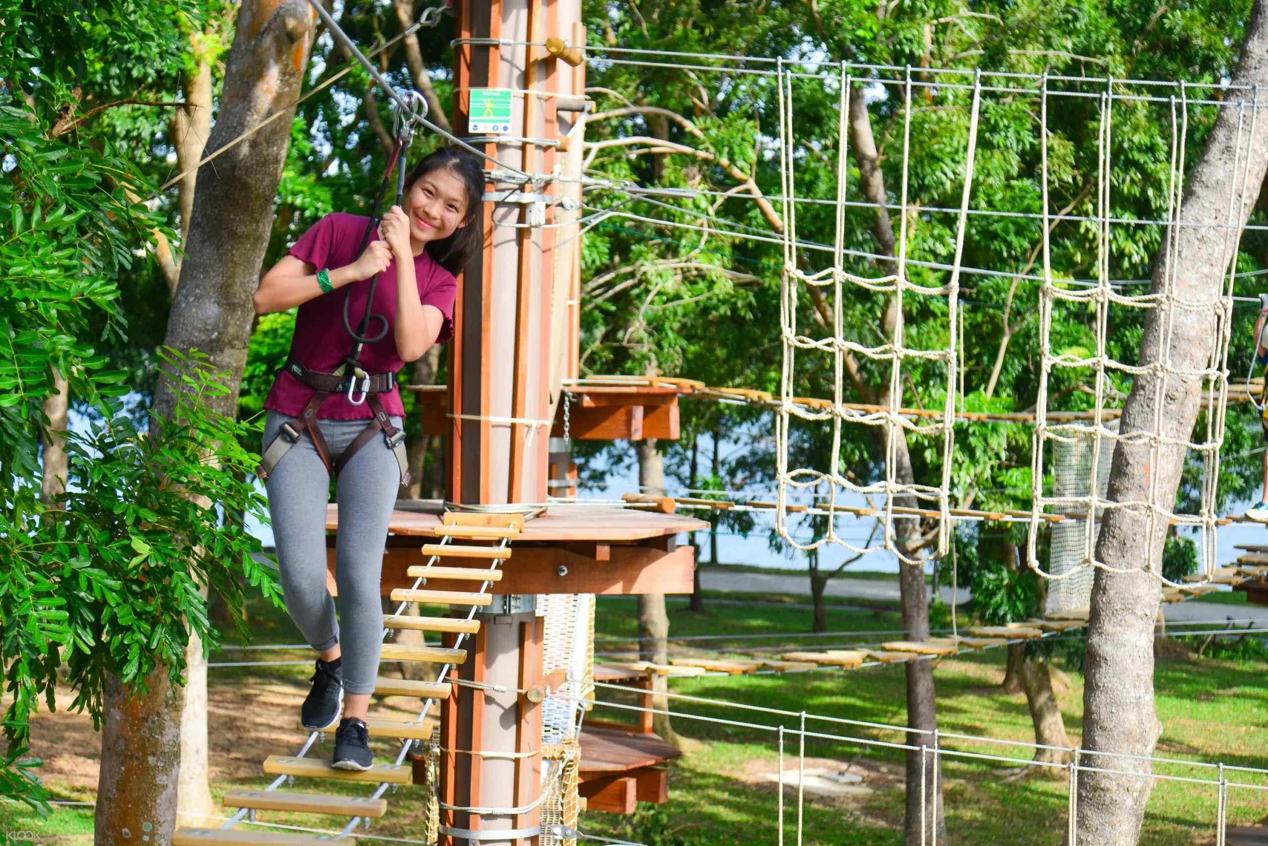 Family enjoying an outdoor adventure park in Singapore